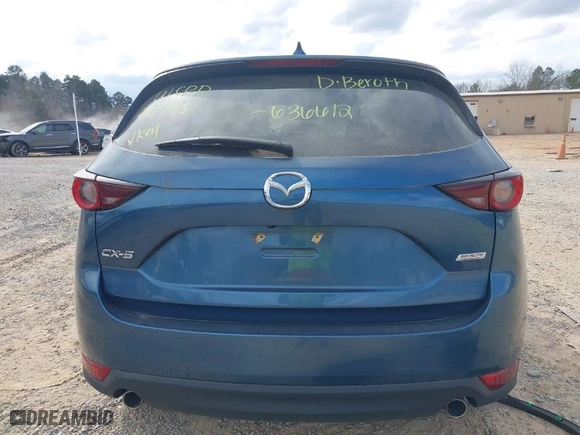 2019 Mazda CX-5 Touring with VIN JM3KFACM9K1636612, listed as a IAAI auction lot 41653029 with NaN miles. Bid and sale history available at carsss.com. Image 17.
