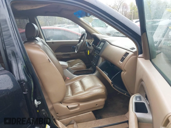 2006 Honda Pilot EX-L with VIN 5FNYF18776B021690, listed as a IAAI auction lot 42016219 with 239,666 mi miles and . Bid and sale history available at DreamBid. Image 5.