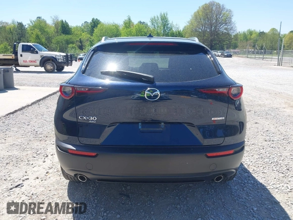 2024 Mazda CX-30 2.5 S Premium Package with VIN 3MVDMBDM7RM654243, listed as a IAAI auction lot 42044783 with 27,936 mi miles. Bid and sale history available at carsss.com. Image 16.