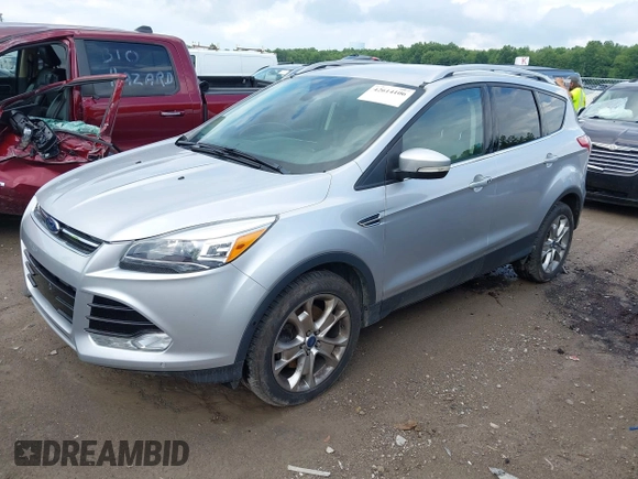 2016 Ford Escape Titanium with VIN 1FMCU9J95GUB93585, listed as a IAAI auction lot 42614106 with 124,465 mi miles and . Bid and sale history available at DreamBid. Image 2.