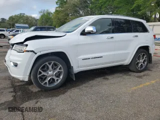 2019 Jeep Grand Cherokee Overland with VIN 1C4RJECG4KC833019, listed as a Copart auction lot 51277555 with 124,072 mi miles and Salvage Title. Bid and sale history available at carsss.com. Image 1.