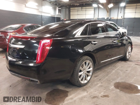 2013 Cadillac XTS Luxury z VIN 2G61R5S34D9102625, wystawiony jako IAAI lot #41668752 z przebiegiem 112 065 mil mil oraz . Historia ofert i sprzedaży dostępna na DreamBid. Obrazek 4.