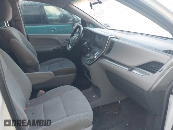 2015 Toyota Sienna L with VIN 5TDZK3DC5FS657115, listed as a IAAI auction lot 42109678 with 176,995 mi miles. Bid and sale history available at carsss.com. Image 5.
