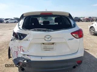 2013 Mazda CX-5 Sport z VIN JM3KE2BE5D0135213, wystawiony jako IAAI lot #42270730 z przebiegiem 140 917 mil mil oraz . Historia ofert i sprzedaży dostępna na DreamBid. Obrazek 16.