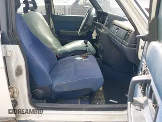 1990 Volvo 240 with VIN YV1AA8855L1855012, listed as a IAAI auction lot 42533844 with 317,063 mi miles and . Bid and sale history available at DreamBid. Image 5.