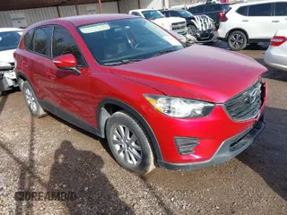 2016 Mazda CX-5 Sport with VIN JM3KE2BY3G0754391, listed as a IAAI auction lot 41719461 with 79,130 mi miles. Bid and sale history available at carsss.com. Image 1.