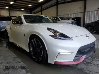 2016 Nissan 370Z Nismo с VIN JN1AZ4EH7GM930385, выставлен на аукционе Copart как лот 48208185 с пробегом 66 972 миль миль и Списание • Salvage title. История ставок и продаж доступна на DreamBid. Изображение 4.