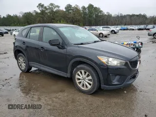 2014 Mazda CX-5 Sport with VIN JM3KE2BEXE0378744, listed as a Copart auction lot 86397414 with 101,011 mi miles and Salvage Title. Bid and sale history available at carsss.com. Image 4.