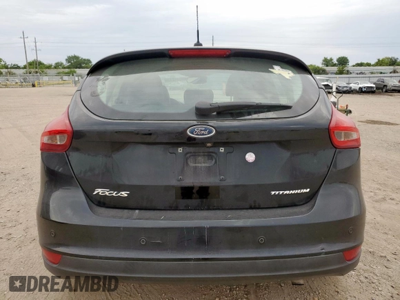 2018 Ford Focus Titanium z VIN 1FADP3N2XJL289659, wystawiony jako Copart lot #65594275 z przebiegiem 115 739 mil mil oraz Czysty tytuł • Clean title. Historia ofert i sprzedaży dostępna na DreamBid. Obrazek 6.