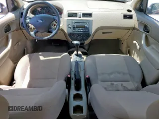 2007 Ford Focus S z VIN 1FAFP34NX7W324146, wystawiony jako Copart lot #59006755 z przebiegiem 160 398 mil mil oraz Szkoda całkowita • Salvage title. Historia ofert i sprzedaży dostępna na DreamBid. Obrazek 8.