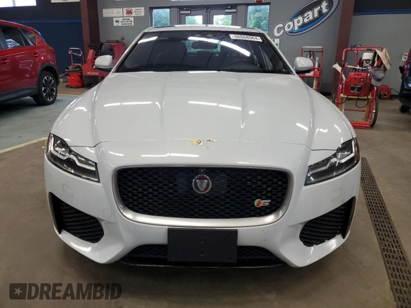 2016 Jaguar XF S with VIN SAJBG4BV0GCY00411, listed as a Copart auction lot 66068964 with 94,983 mi miles and Salvage Title. Bid and sale history available at carsss.com. Image 5.
