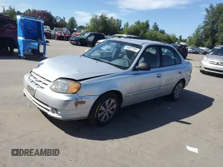 2005 Hyundai Accent GLS with VIN KMHCG45C55U623340, listed as a Copart auction lot 59587304 with 275,364 mi miles and Salvage Title. Bid and sale history available at carsss.com. Image 1.