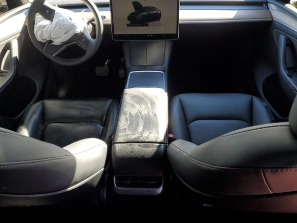 2024 Tesla Model Y Long Range z VIN 7SAYGDEEXRA222408, wystawiony jako Copart lot #49119125 z przebiegiem 20 773 mil mil oraz Szkoda całkowita • Salvage title. Historia ofert i sprzedaży dostępna na DreamBid. Obrazek 8.