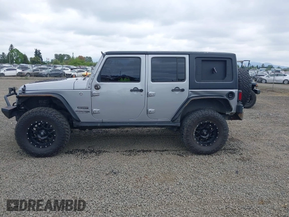 2018 Jeep Wrangler Unlimited Sport S with VIN 1C4BJWDG4JL861052, listed as a IAAI auction lot 42100517 with 43,907 mi miles and . Bid and sale history available at DreamBid. Image 15.
