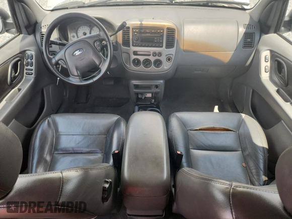 2003 Ford Escape XLT Popular with VIN 1FMYU03103KA06199, listed as a Copart auction lot 58731515 with 181,429 mi miles and Salvage title. Bid and sale history available at DreamBid. Image 8.
