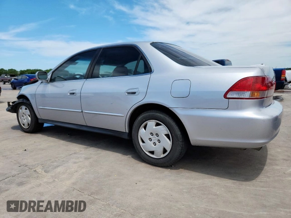 2001 Honda Accord LX z VIN 1HGCG16471A077440, wystawiony jako Copart lot #57621925 z przebiegiem 178 297 mil mil oraz Szkoda całkowita • Salvage title. Historia ofert i sprzedaży dostępna na DreamBid. Obrazek 2.