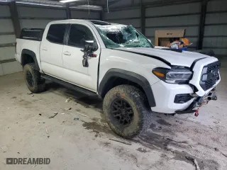 2020 Toyota Tacoma 4WD SR5 with VIN 5TFCZ5AN4LX225172, listed as a Copart auction lot 47934125 with 42,928 mi miles and Salvage Title. Bid and sale history available at carsss.com. Image 4.