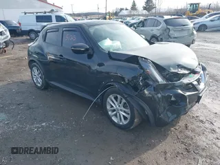 2015 Nissan Juke SV with VIN JN8AF5MV5FT557407, listed as a IAAI auction lot 41535125 with 124,000 mi miles. Bid and sale history available at carsss.com. Image 1.