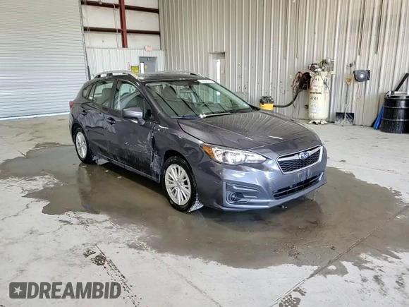 2017 Subaru Impreza Premium z VIN 4S3GTAB66H3711337, wystawiony jako Copart lot #53454715 z przebiegiem 131 102 mil mil oraz Szkoda całkowita • Salvage title. Historia ofert i sprzedaży dostępna na DreamBid. Obrazek 13.