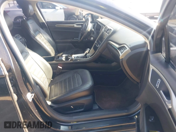 2014 Ford Fusion SE with VIN 3FA6P0HD4ER390773, listed as a IAAI auction lot 42088373 with 265,001 mi miles and . Bid and sale history available at DreamBid. Image 5.