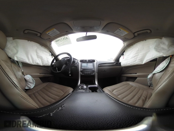2017 Ford Fusion Energi SE with VIN 3FA6P0PU9HR227932, listed as a IAAI auction lot 42177500 with 106,938 mi miles. Bid and sale history available at carsss.com. Image 18.