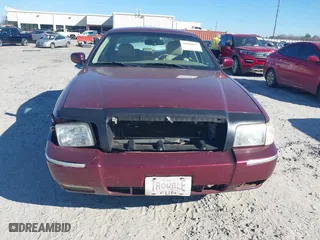 2006 Mercury Grand Marquis LS Premium with VIN 2MEFM75V06X622375, listed as a IAAI auction lot 41686035 with 165,495 mi miles. Bid and sale history available at carsss.com. Image 6.
