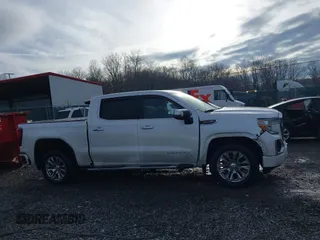 2020 GMC Sierra 1500 Denali with VIN 1GTU9FED8LZ370425, listed as a IAAI auction lot 41172378 with 57,291 mi miles and . Bid and sale history available at DreamBid. Image 13.