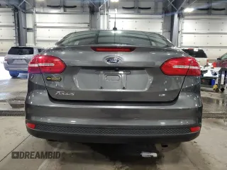 2017 Ford Focus SE with VIN 1FADP3F21HL205754, listed as a Copart auction lot 63632985 with 96,797 mi miles and Salvage title. Bid and sale history available at DreamBid. Image 6.