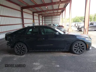 2023 BMW 4 Series 430i xDrive z VIN WBA73AV00PFP22674, wystawiony jako IAAI lot #42619544 z przebiegiem 37 837 mil mil oraz . Historia ofert i sprzedaży dostępna na DreamBid. Obrazek 13.