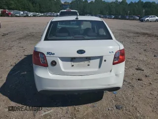 2010 Kia Rio LX with VIN KNADH4A31A6635895, listed as a Copart auction lot 61308434 with 209,016 mi miles and Salvage Title. Bid and sale history available at carsss.com. Image 6.
