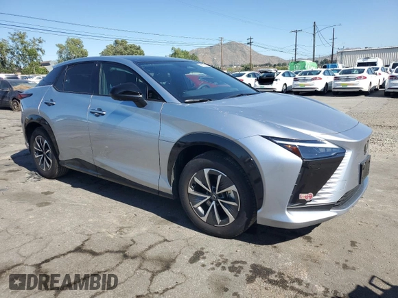 2024 Lexus RZ 300e Premium z VIN JTJABABB6RA002164, wystawiony jako Copart lot #56575245 z przebiegiem 11 687 mil mil oraz Szkoda całkowita • Salvage title. Historia ofert i sprzedaży dostępna na DreamBid. Obrazek 4.