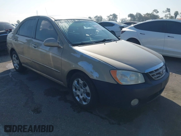 2004 Kia Spectra LX with VIN KNAFE122145013930, listed as a IAAI auction lot 41627031 with 93,565 mi miles. Bid and sale history available at carsss.com. Image 1.