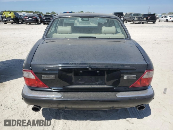 2003 Jaguar XJ with VIN SAJDA15B83MF58887, listed as a Copart auction lot 51057895 with 189,770 mi miles and Clean title. Bid and sale history available at DreamBid. Image 6.