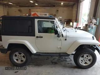 2015 Jeep Wrangler Sahara with VIN 1C4AJWBG7FL648621, listed as a IAAI auction lot 42439781 with 107,148 mi miles and . Bid and sale history available at DreamBid. Image 13.