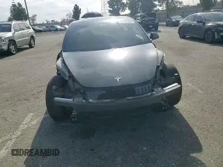 2023 Tesla Model 3 с VIN 5YJ3E1EA9PF676724, выставлен на аукционе Copart как лот 46357805 с пробегом Не указан миль и Списание • Salvage title. История ставок и продаж доступна на DreamBid. Изображение 11.