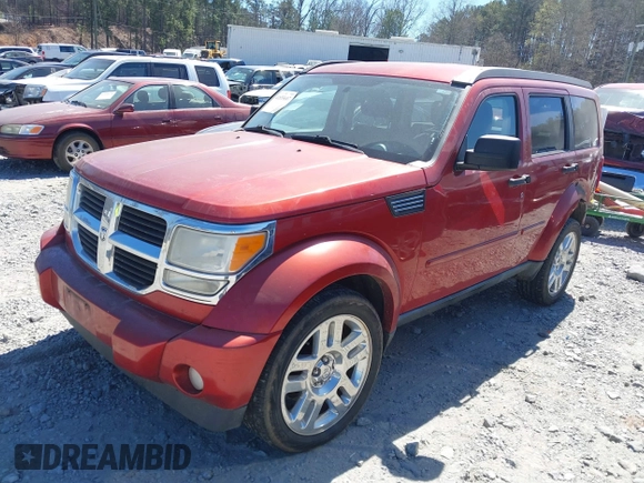 2010 Dodge Nitro SE with VIN 1D4PT2GK7AW142856, listed as a IAAI auction lot 41855687 with 197,248 mi miles. Bid and sale history available at carsss.com. Image 18.