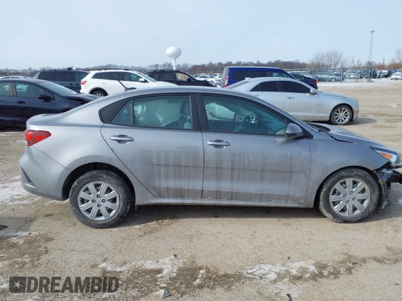 2023 Kia Rio LX z VIN 3KPA24AD4PE614445, wystawiony jako IAAI lot #41604522 z przebiegiem 15 649 mil mil oraz . Historia ofert i sprzedaży dostępna na DreamBid. Obrazek 14.