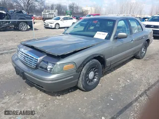 2001 Ford Crown Victoria LX with VIN 2FAFP74W01X102534, listed as a IAAI auction lot 42017605 with 160,063 mi miles. Bid and sale history available at carsss.com. Image 2.