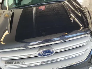 2019 Ford Escape Titanium with VIN 1FMCU9J96KUA01051, listed as a IAAI auction lot 42841649 with 69,720 mi miles and . Bid and sale history available at DreamBid. Image 3.