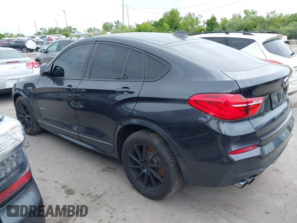 2015 BMW X4 xDrive28i with VIN 5UXXW3C54F0M88740, listed as a IAAI auction lot 42275157 with 159,281 mi miles and . Bid and sale history available at DreamBid. Image 3.