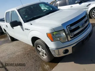 2013 Ford F-150 XL with VIN 1FTFW1CF2DKF73989, listed as a IAAI auction lot 41795990 with 142,387 mi miles. Bid and sale history available at carsss.com. Image 1.