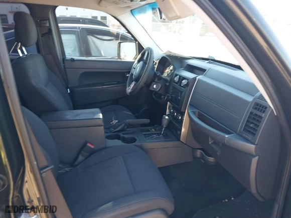 2011 Jeep Liberty Sport with VIN 1J4PN2GK8BW509475, listed as a IAAI auction lot 41609236 with 190,566 mi miles. Bid and sale history available at carsss.com. Image 5.