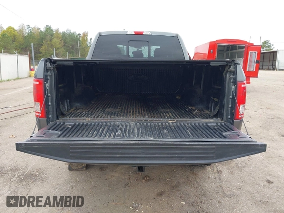 2015 Ford F-150 XLT with VIN 1FTEX1EP7FFA52955, listed as a IAAI auction lot 40799137 with 134,290 mi miles. Bid and sale history available at carsss.com. Image 17.