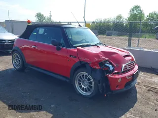 2006 MINI Convertible S with VIN WMWRH33596TK58563, listed as a IAAI auction lot 42210790 with 102,476 mi miles and . Bid and sale history available at DreamBid. Image 1.