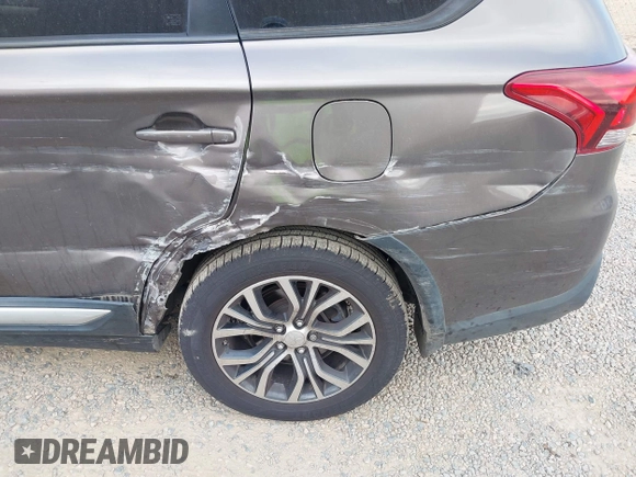 2016 Mitsubishi Outlander SE with VIN JA4AD3A38GZ048297, listed as a IAAI auction lot 42634676 with 223,715 mi miles and . Bid and sale history available at DreamBid. Image 12.