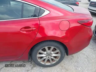 2016 Mazda 6 i Sport with VIN JM1GJ1U56G1409311, listed as a IAAI auction lot 41906256 with 126,548 mi miles and . Bid and sale history available at carsss.com. Image 6.