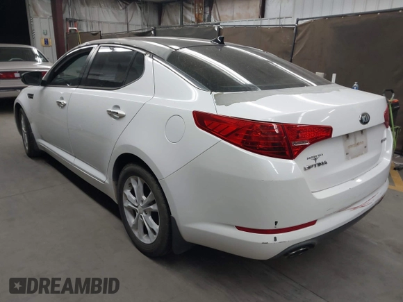 2013 Kia Optima EX with VIN 5XXGN4A79DG120709, listed as a IAAI auction lot 42004745 with 171,409 mi miles. Bid and sale history available at carsss.com. Image 3.