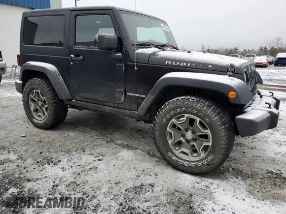 2013 Jeep Wrangler Rubicon 10th Anniversary with VIN 1C4BJWCG6DL507667, listed as a Copart auction lot 84139134 with 264,970 mi miles and Salvage Title. Bid and sale history available at DreamBid. Image 4.