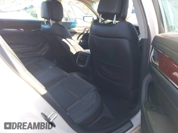 2014 Cadillac CTS Sedan RWD with VIN 1G6AP5SX3E0130274, listed as a IAAI auction lot 41293553 with 138,524 mi miles. Bid and sale history available at carsss.com. Image 8.