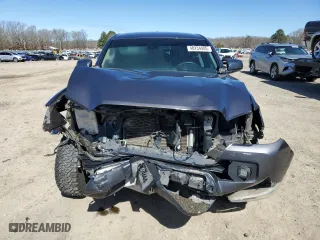 2021 Toyota Tacoma 4WD SR with VIN 5TFCZ5AN6MX252195, listed as a Copart auction lot 48234085 with 56,983 mi miles and Salvage Title. Bid and sale history available at carsss.com. Image 5.
